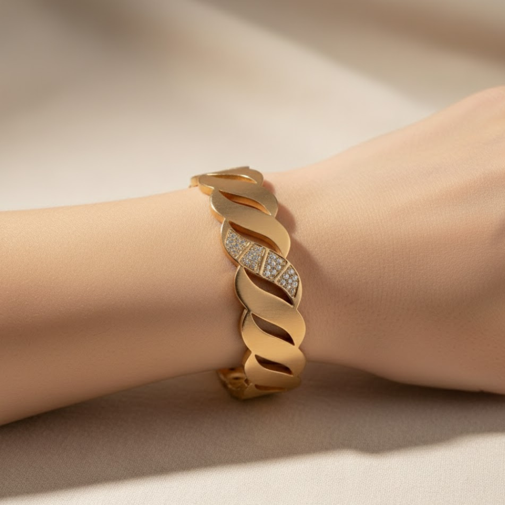 Elegant Gold-Tone Twisted Design Bracelet with Diamond Accents - Image 3
